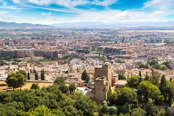 Panoramic view of Granada with Sierra Nevada in the background.